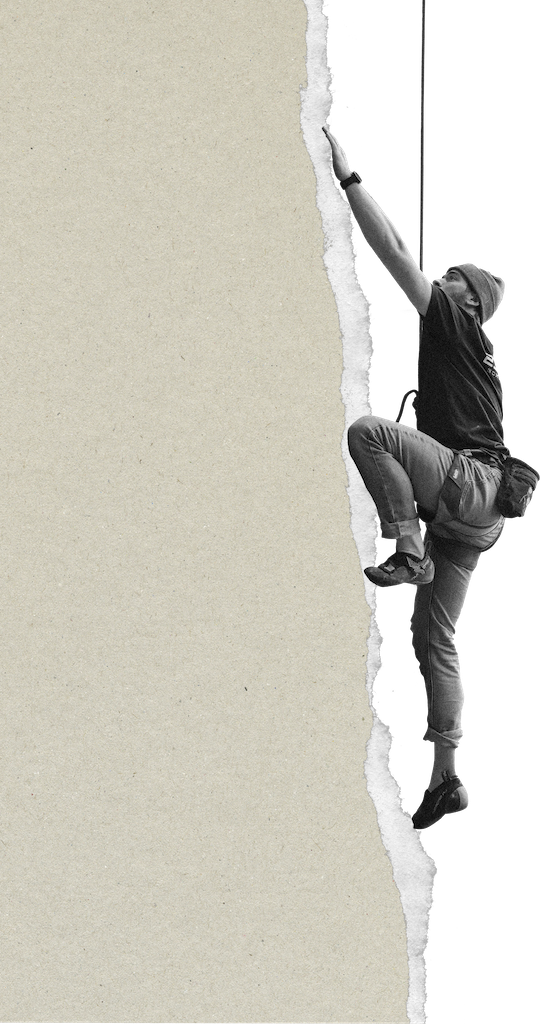 A climber scaling a torn edge